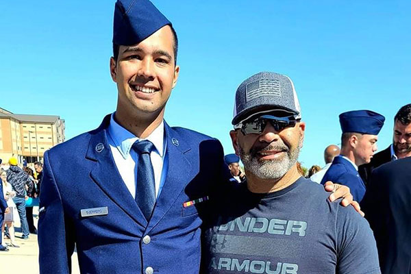Marcus in uniform with his dad, Felipe